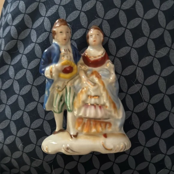 Collection of hand-painted porcelain figurines, from the Occupied Japan period